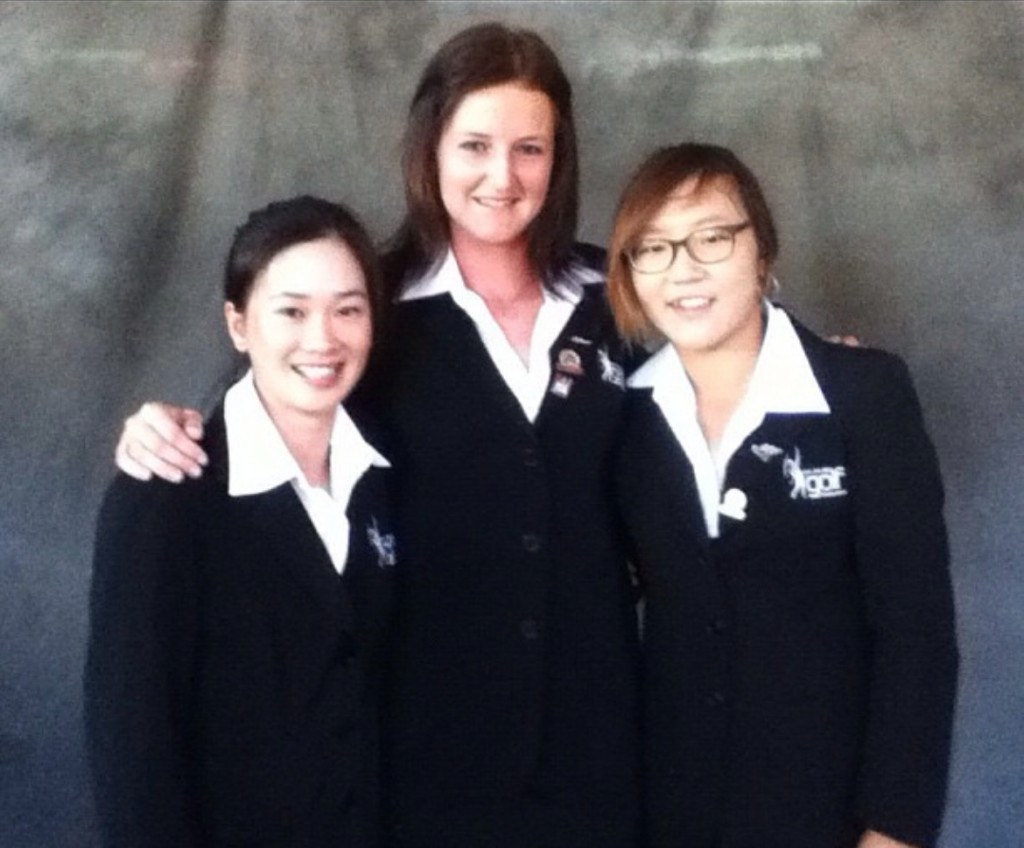 Emily Perry with her New Zealand golf teammates
