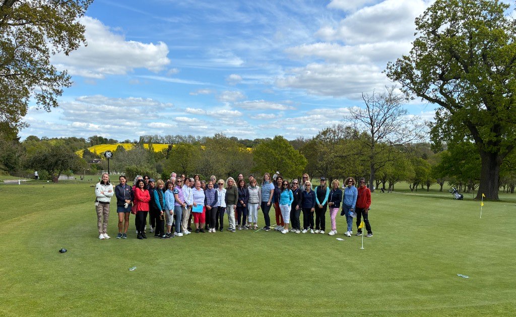 Perry Performance Roses golfers together on the course